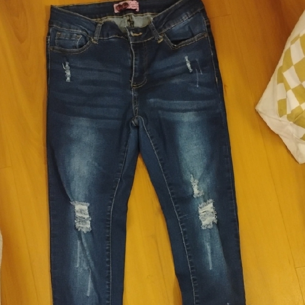 Women's Distressed Blue Jeans